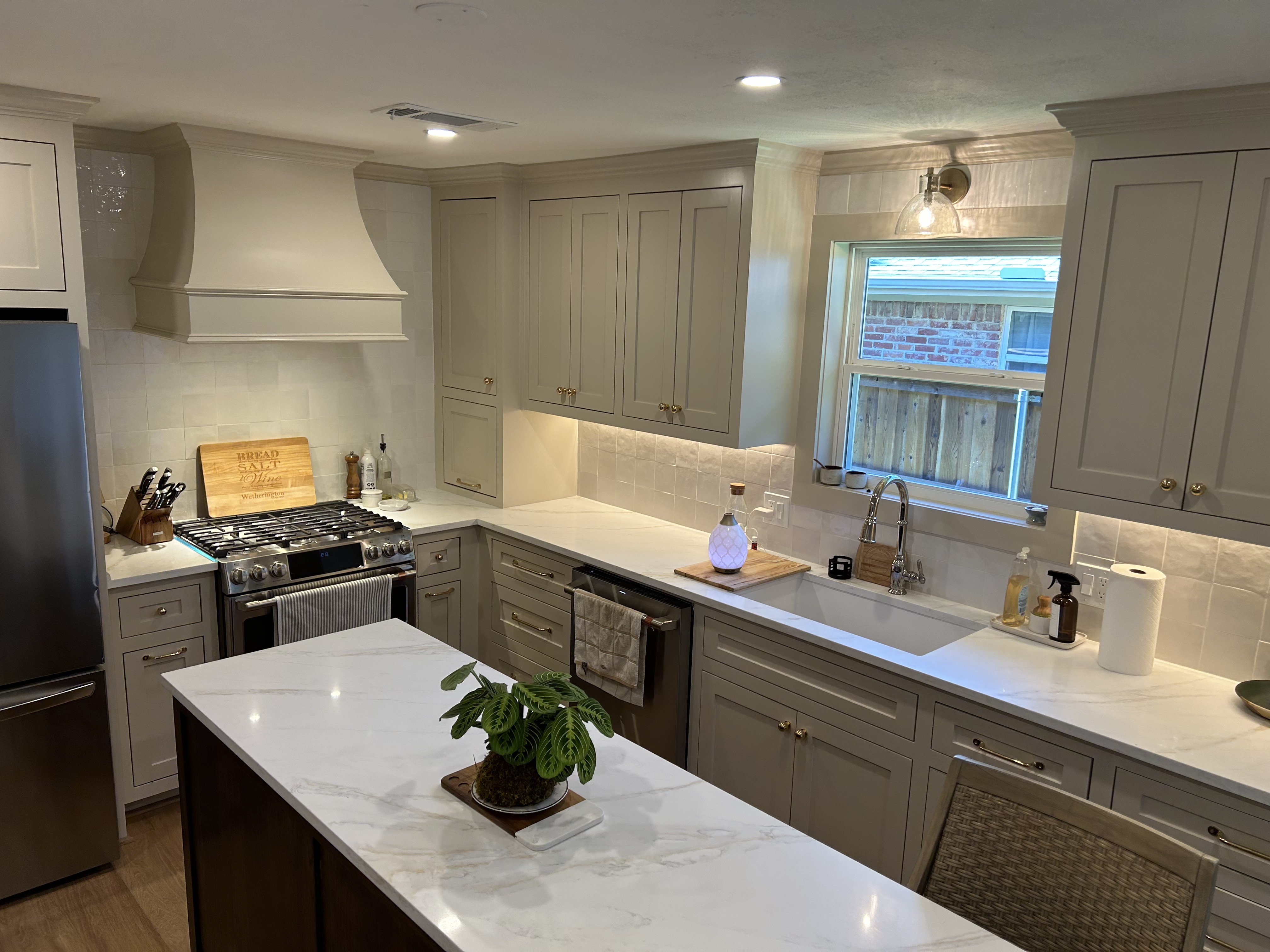 Completed kitchen with custom cabinetry and considered material palette